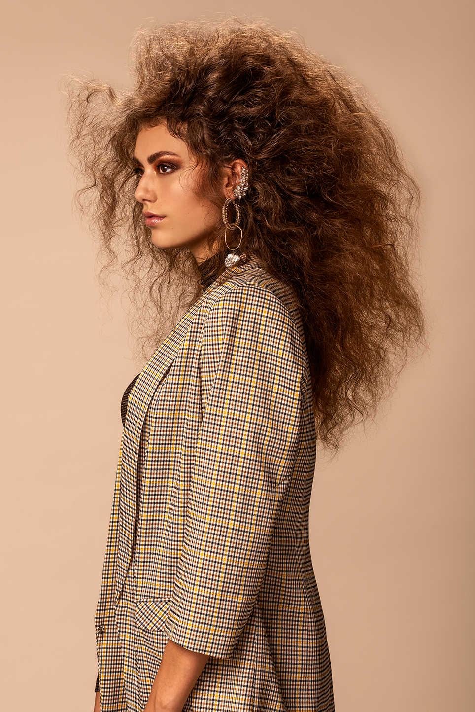 Model on a beige background with Lion Hair