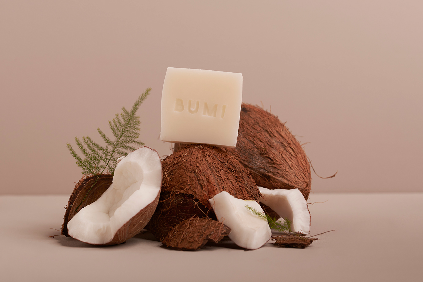 Soapbar on a Taupe background with Coconut smell, placed on a coconut.