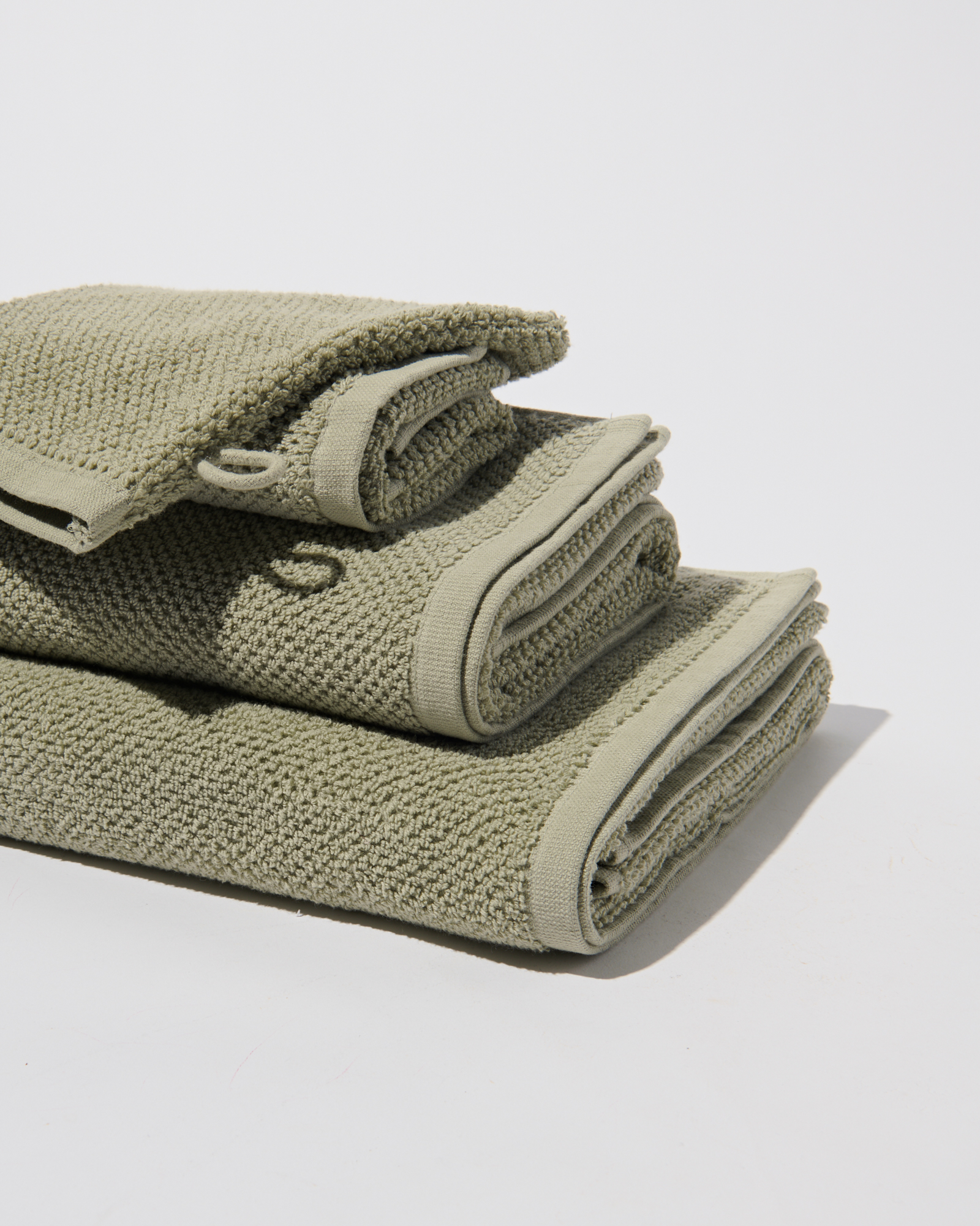 Group of Towels, so you can see the different sizes. In a green colour