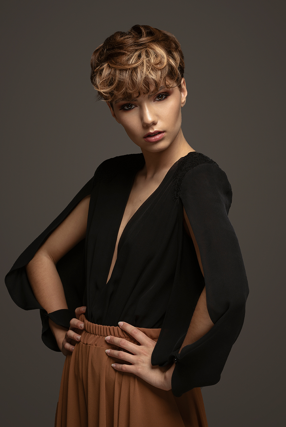 Campaign for a hair brand, showing styling in earthy tones.